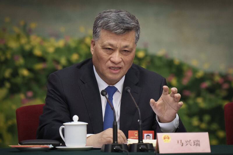 前新疆黨委書記馬興瑞(見圖)在內的多名新疆高官接連落馬。(美聯檔案照) 前新疆党委书记马兴瑞(见图)在内的多名新疆高官接连落马。 (美联档案照)